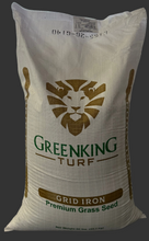 Bag of Greenking Turf Grid Iron Premium Grass Seed on a grey background